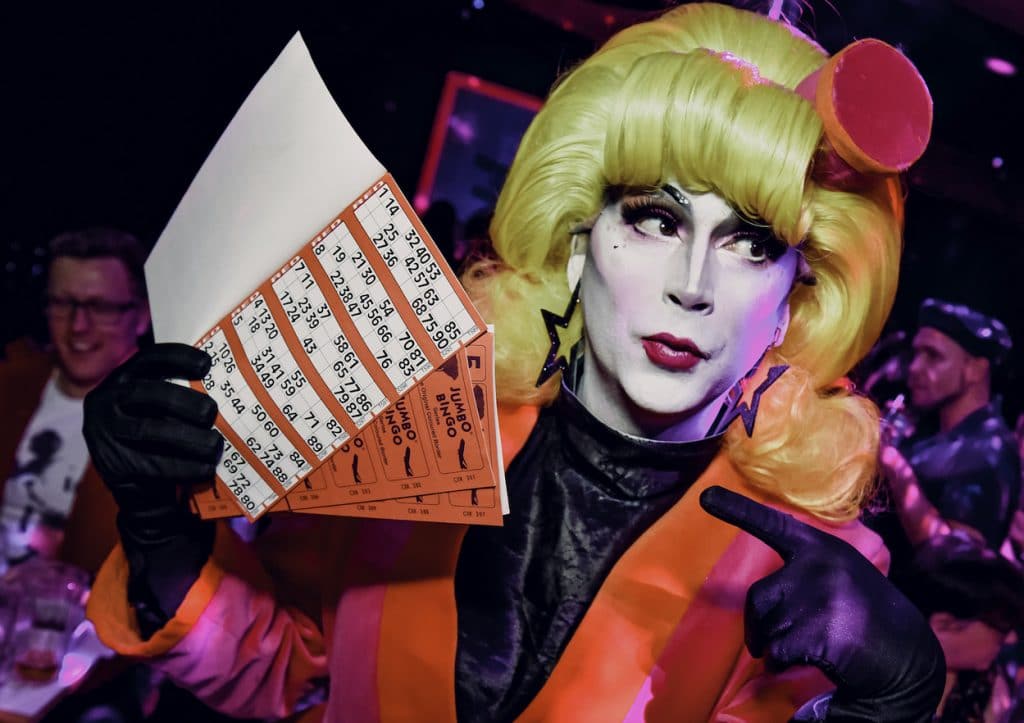 drag queen with bingo cards