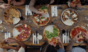 chefs-table-pizza-range-of-pizzas-on-set-table