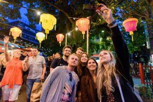people-taking-photo-with-lanterns-at-manchester-moon-festival