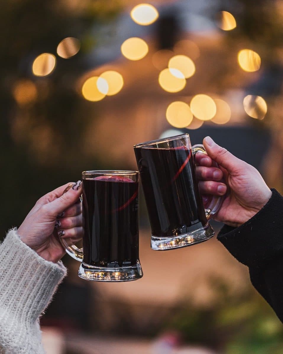 mulled-wine-mugs-cheersing-at-escape-to-freight-island-manchester