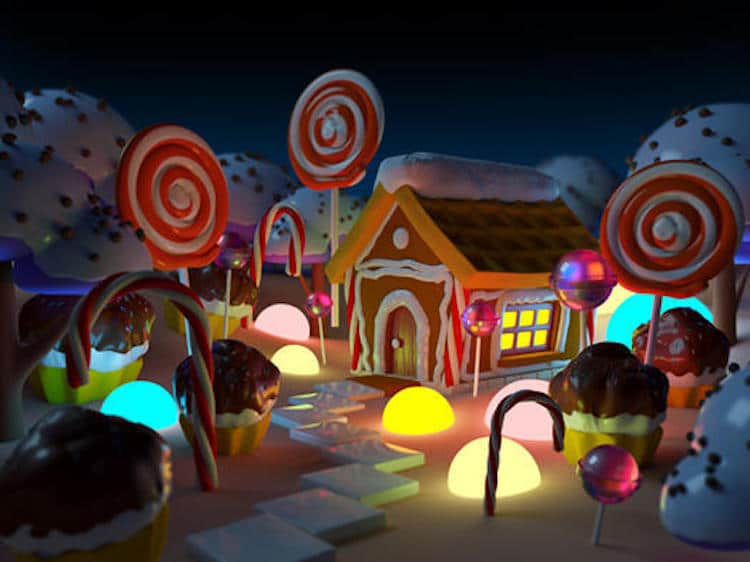 a gingerbread house surrounded by lollies and glowing gumdrops