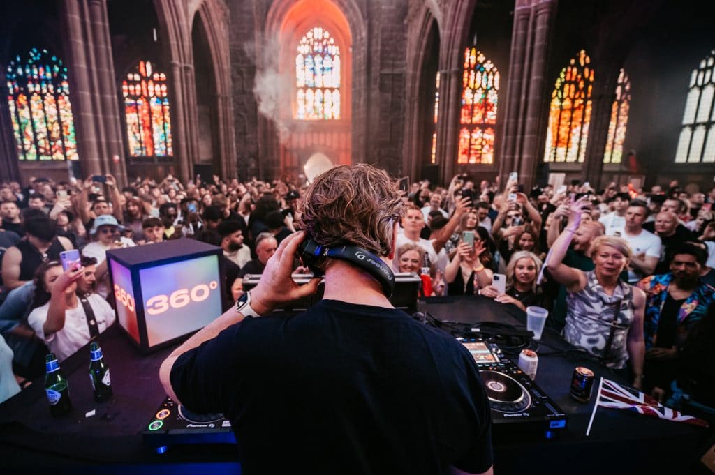 DJ John Digweed playing to partygoers in Manchester Cathedral at Manchester 360