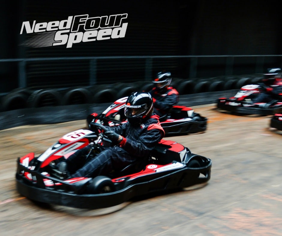 friends go karting on indoor track in manchester