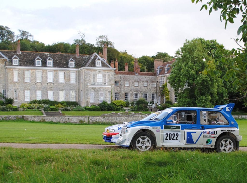rally cars in front of Firle estate