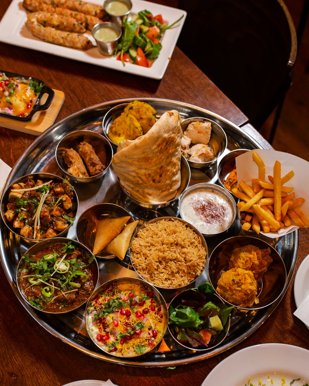 Small plates of Indian food at Scene Indian Kitchen in Manchester