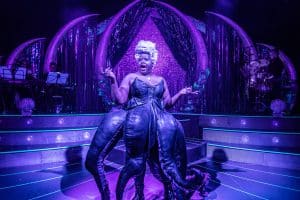 ursula-on-stage-with-purple-tentacles