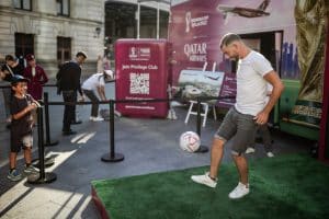 person-kicking-football-at-qatar-airways-pop-up