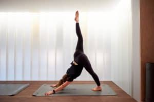 woman-stretching-in-yoga-position-yoga-and-pilates-are-some-of-the-free-classes-at-blok-manchester-this-weekend