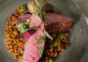 roast-duck-with-lentils-broad-beans-and-artichoke-at-mount-street