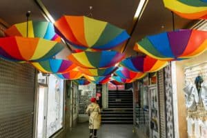 entrance-to-afflecks-with-rainbow-umbrellas-on-ceiling-of-arcade