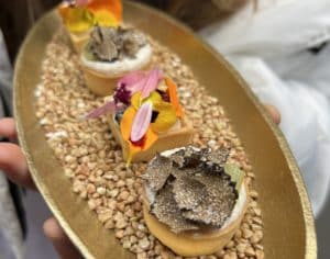 canapes-with-brightly-coloured-flowers-and-truffle-shavings-on-top-by caroline-martins-another-trader-coming-to-the-multi-kitchen-at-exhibition-mcr