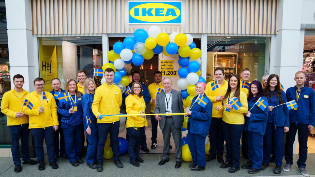 group-of-ikea-co-workers-in-front-of-the-entrance-of-ikea-stockport