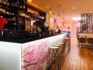 o-kitchen-didsbury-bar-with-cherry-blossom-design-and-stools