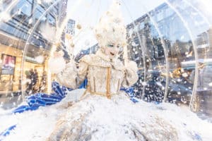 woman-in-snowglobe-as-part-of-festive-sundays-events