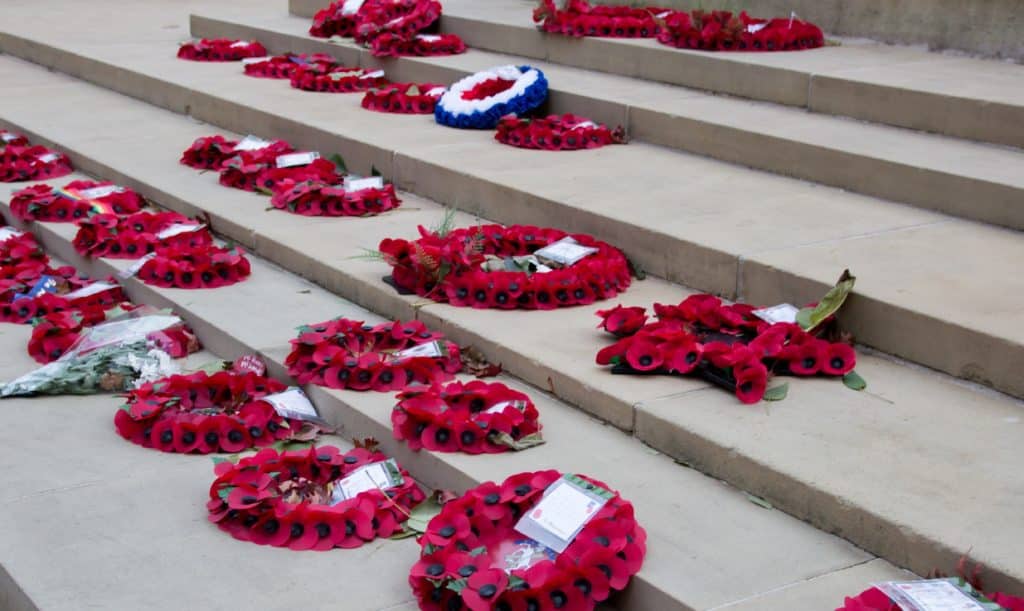 poppy-wreaths-laid-on-steps-at-cenotaph-in-st-peters-square-manchester-for-remembrance-sunday
