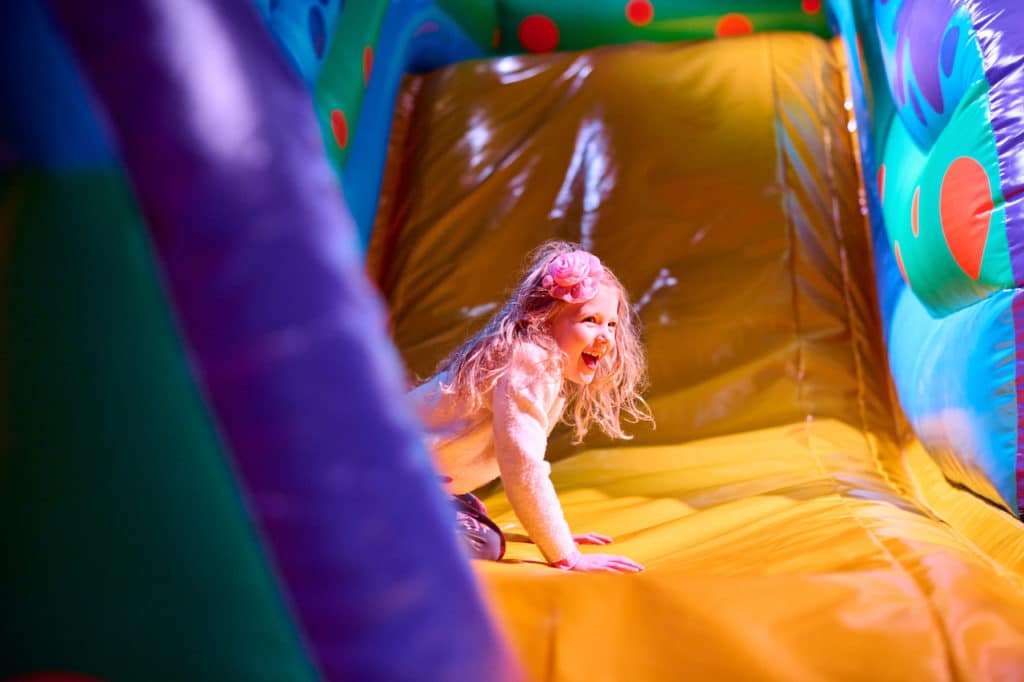 a child on a bouncy castle at Dreamland imaginarium