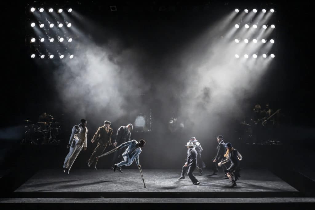 men-dancing-on-stage-at-peaky-blinders-theatre-show