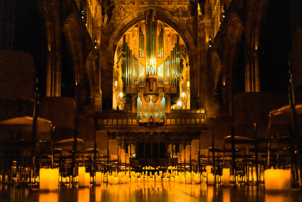 Manchester Cathedral illuminated by candles