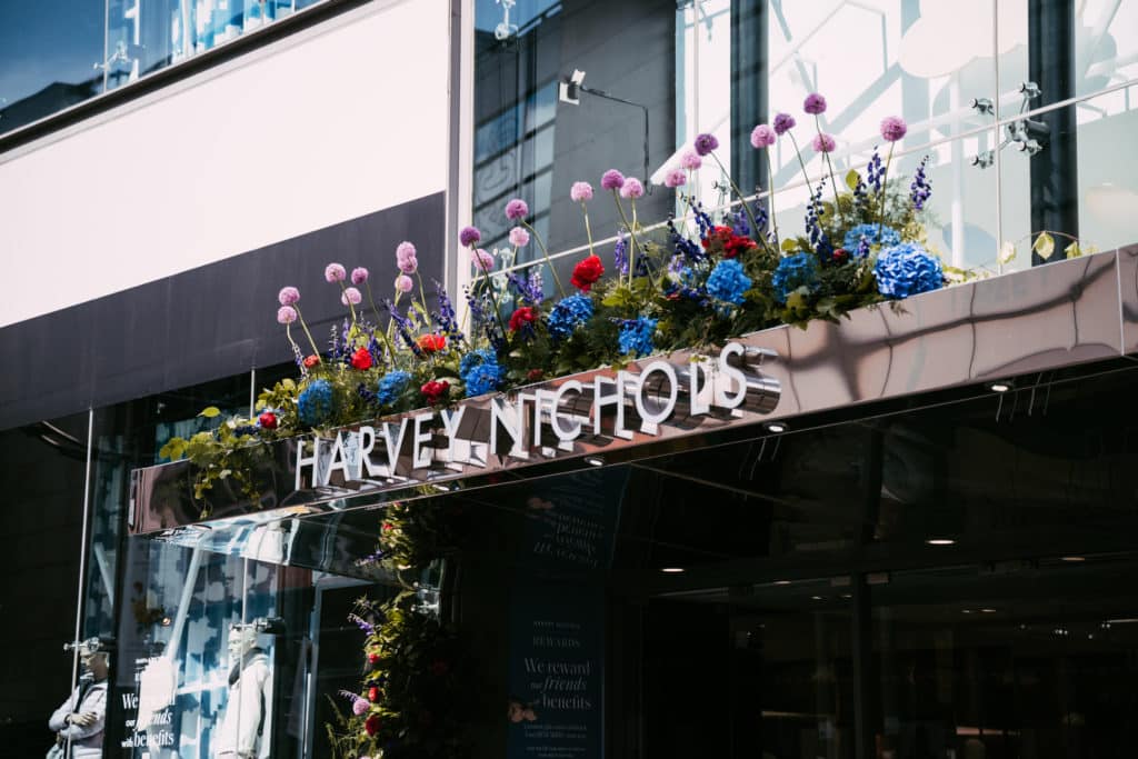 flowers-on-top-of-harvey-nichols-manchester-entrance
