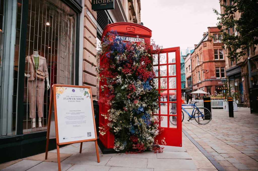 telephone-box-filled-with-flowers-manchester-flower-festival