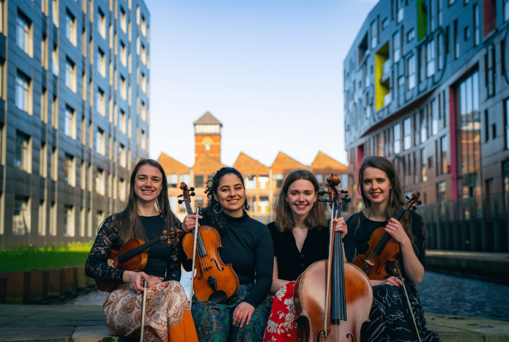 vulva-voce-group-with-string-instruments-part-of-mif-festival-square-line-up