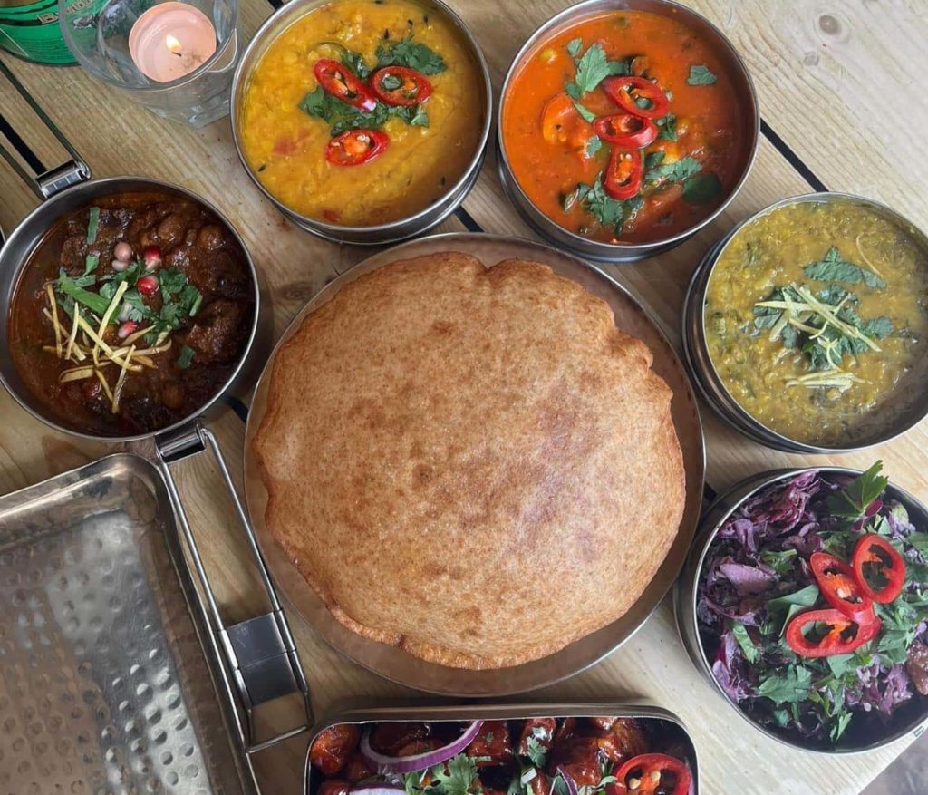 selection-of-tali-dishes-at-mowgli-like-dal-curries-paratha