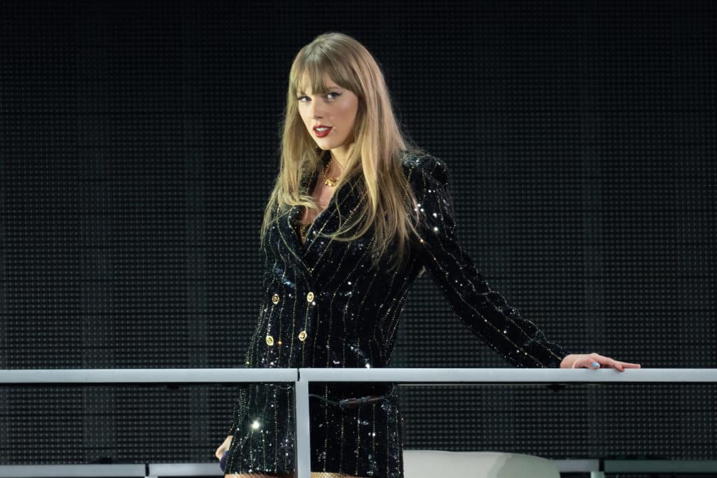 taylor-swift-performing-on-stage-who-has-announced-eras-world-tour-dates