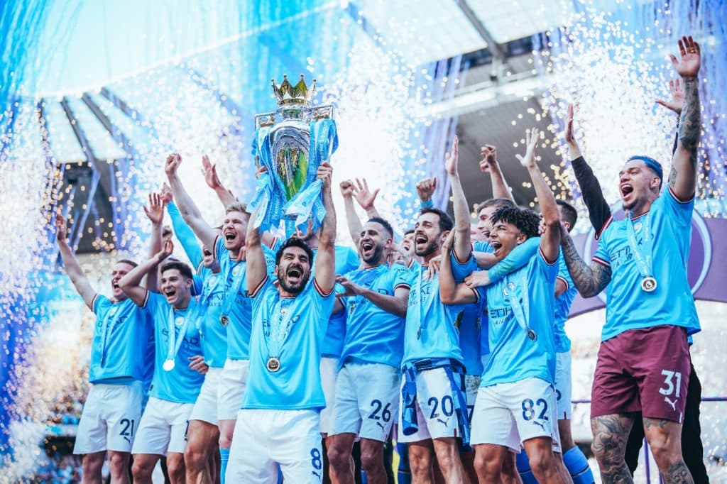 manchester-city-football-team-with-trophy-namd-most-valuable-club-brand