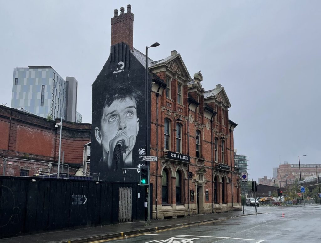 new-ian-curtis-mural-revealed-on-side-of-star-and-garter-pub-manchester