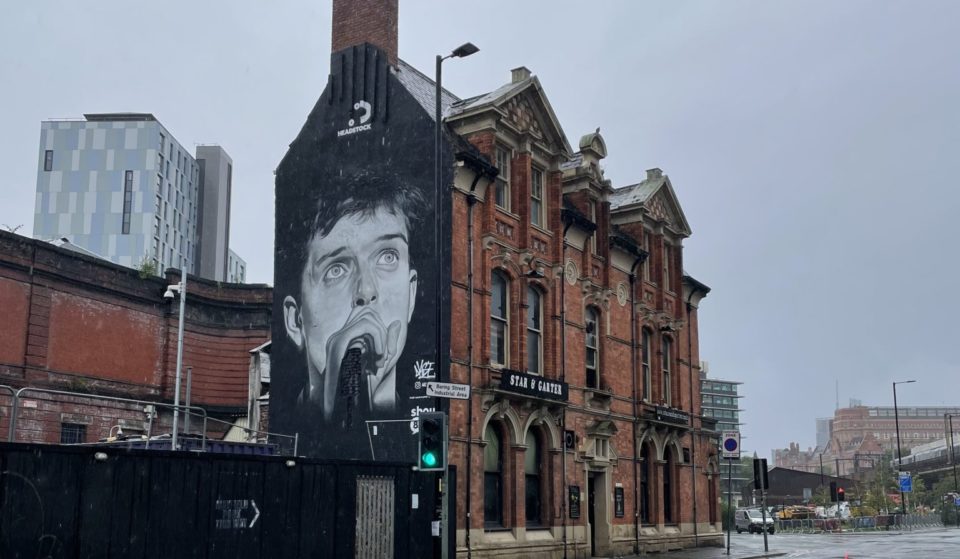 Iconic Ian Curtis Mural Has Returned To Manchester One Year After Being Covered Up