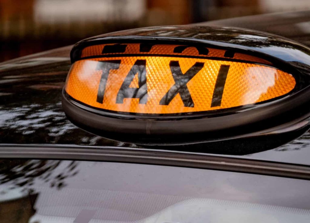 taxi-sign-on-black-cab
