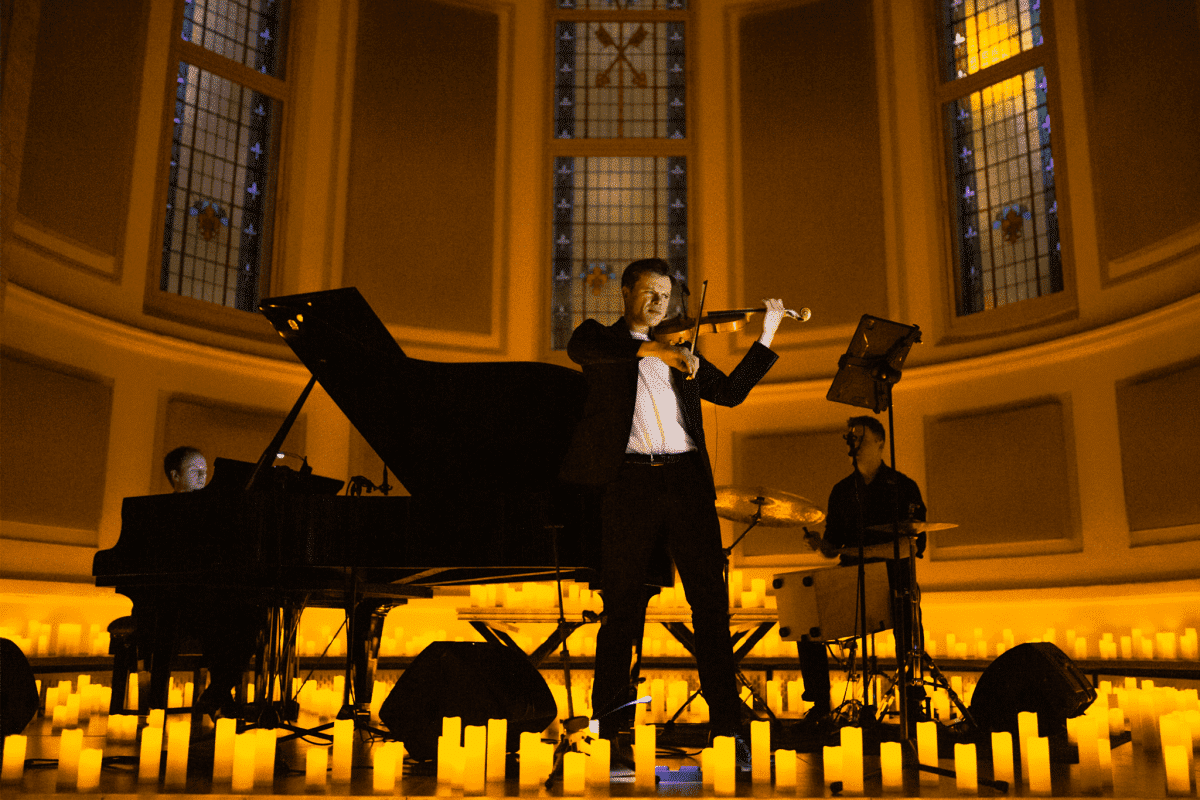Musicians performing by candlelight at Hallé St Peter's