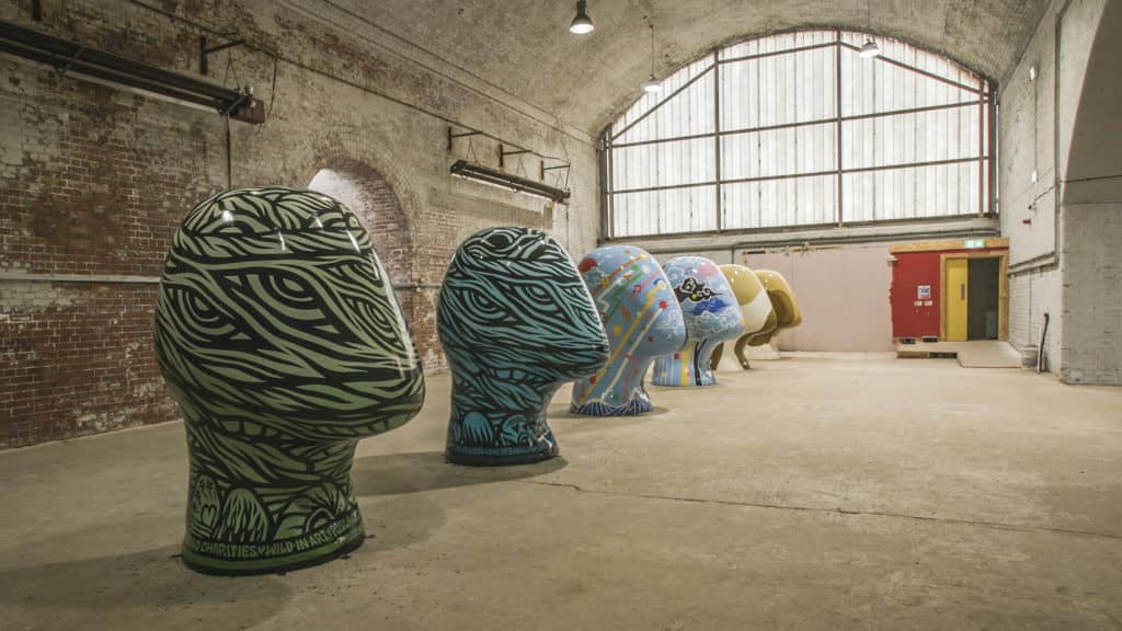 row-of-head-sculptures-six-places-in-a-different-light