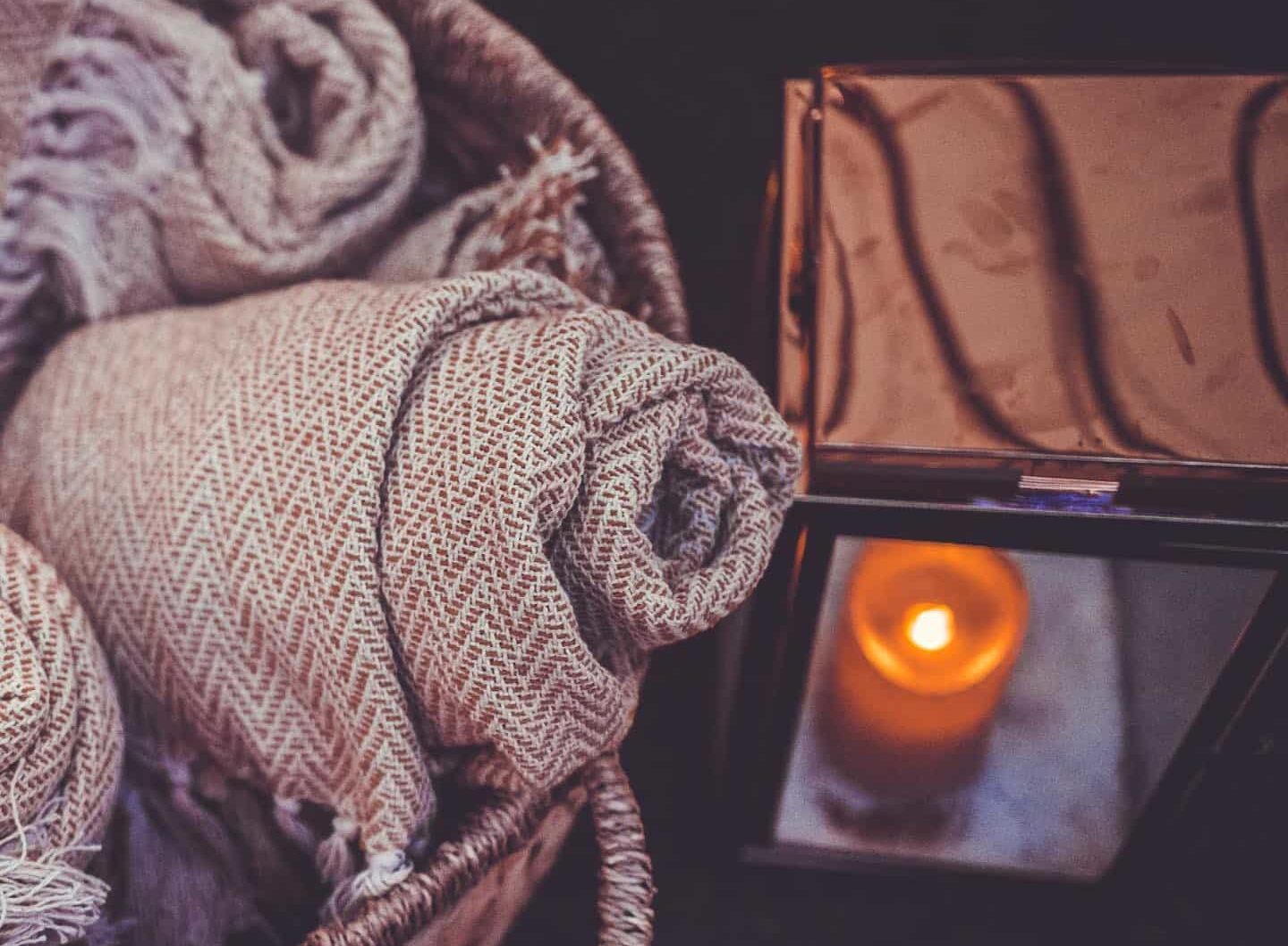 lawn-club-blankets-in-basket-candle