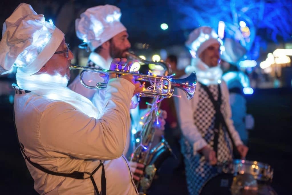 musicians-with-christmas-lights-on-uniforms